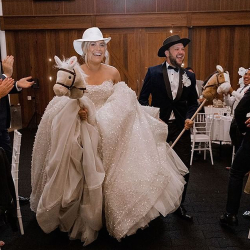 Kristy & Jake Wedding Entry on Stick Horses