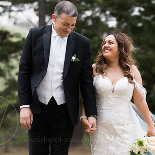 Bride & Groom holding hands following wedding at Seclusions, Blue Mountains. Entertainment by Hawkesbury Wedding DJ and Blue Mountains Wedding DJ MC.